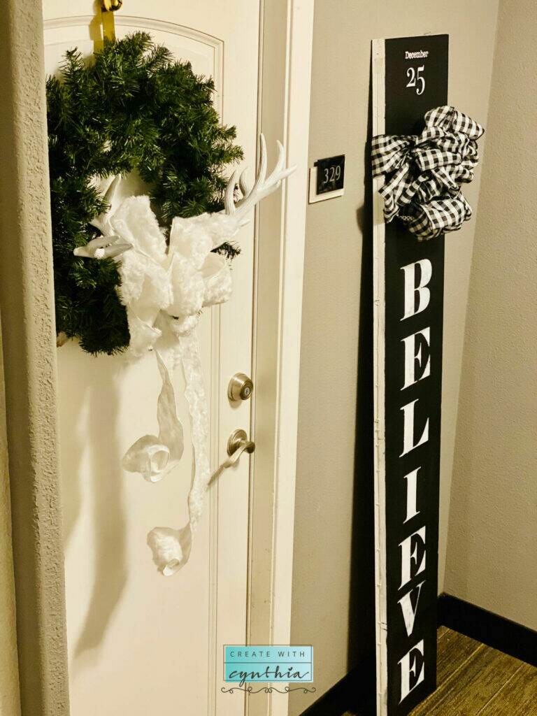 diy paint, debi's design diary, create with cynthia, cynthia nessel, holiday front decor decor, front door holiday decorations, 5 things you need to decorate your front door, diy wood sign, diy holiday sign, believe, christmas decor, essential stencils, rustoleum,