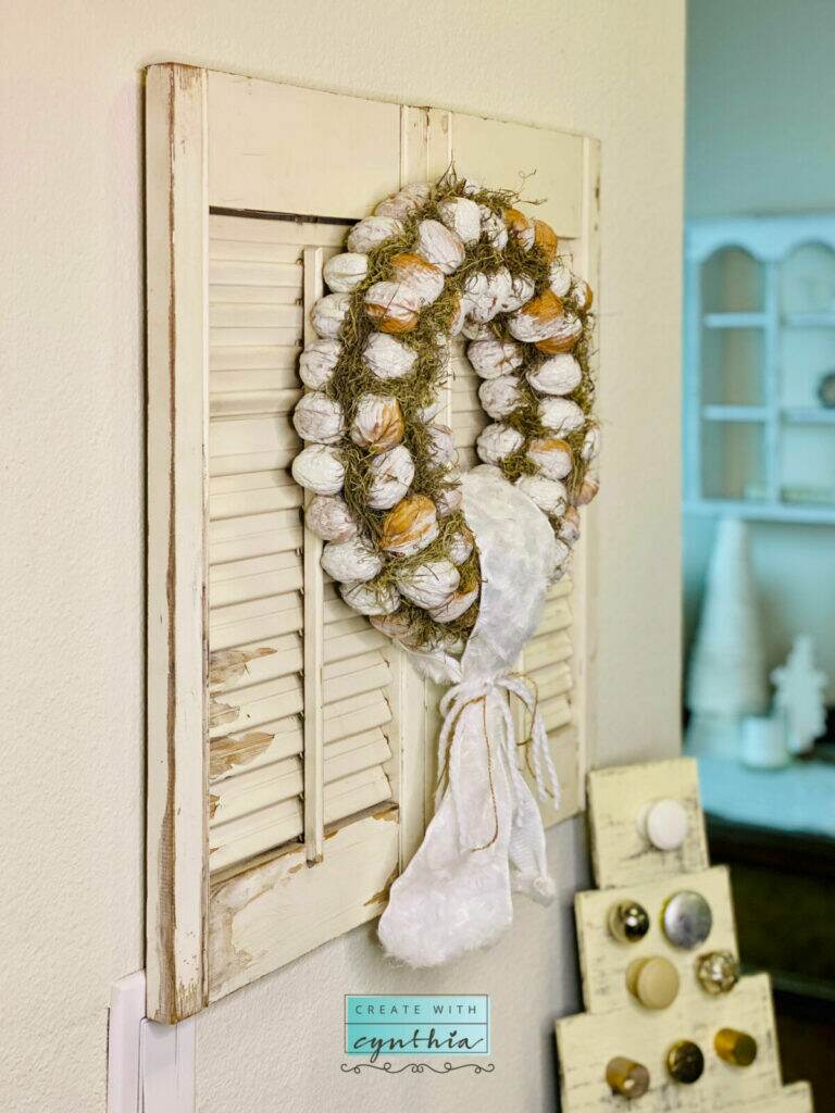 Shutter with a Walnut Wreath.