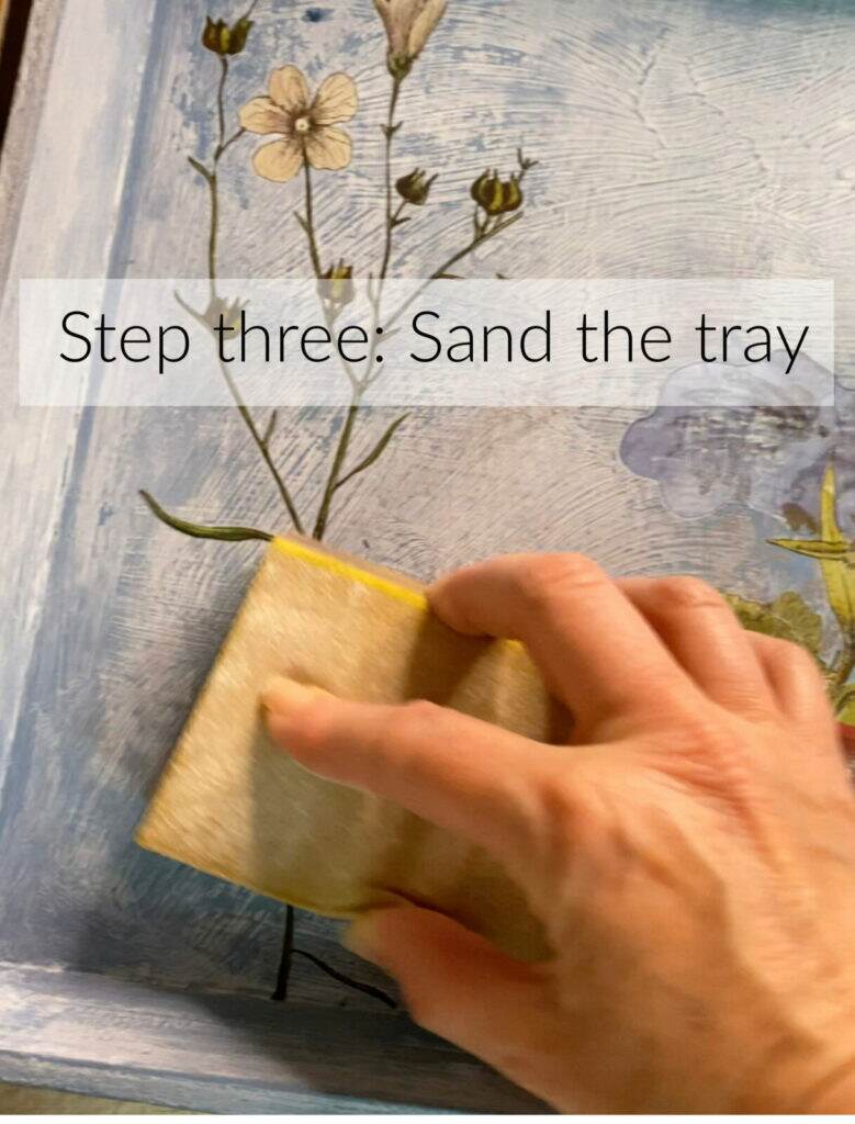 Step three sanding the tray.