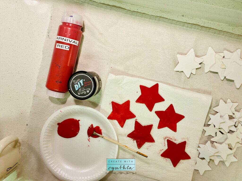 Painting stars red for star wreath.